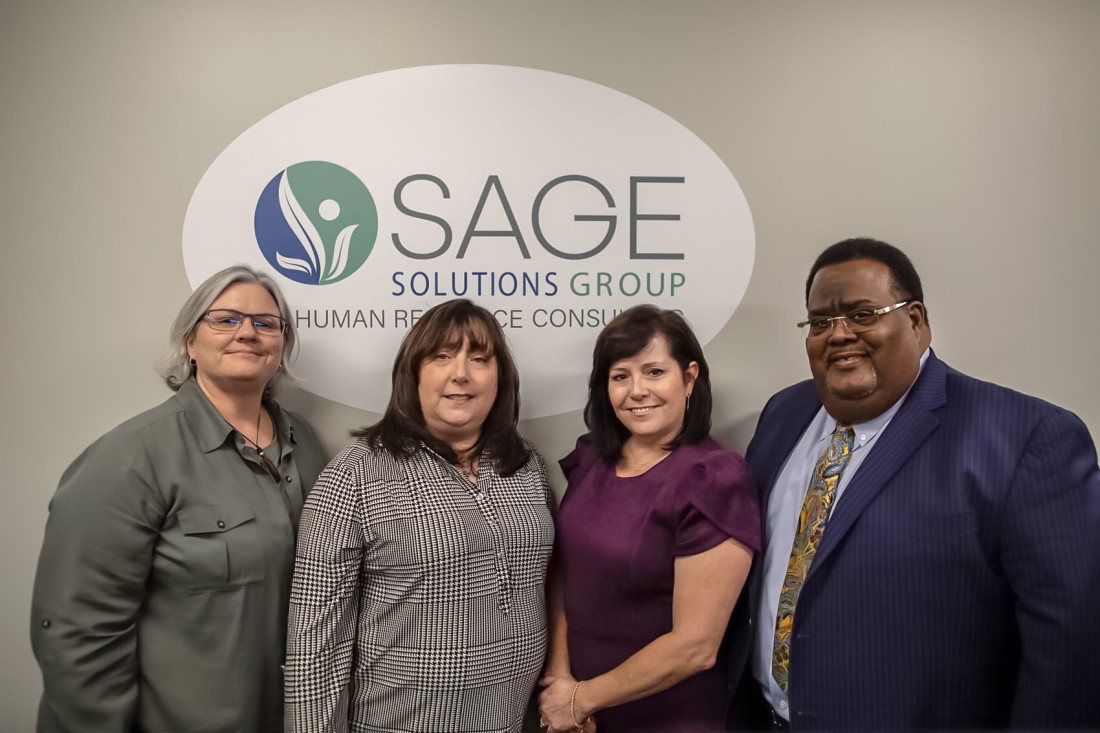 Sherri McDaniel, Dr. Heidi Reyst, Monique Kurkowski, and Leamon Sowell - Leadership at Sage Solutions Group